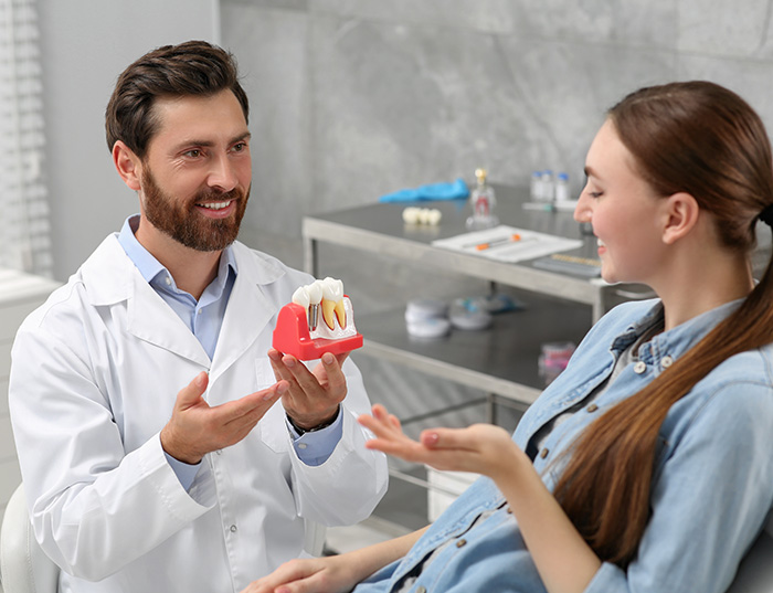 Advanced Tooth Replacement Solutions: How an Implant Dentist Laurel Restores Healthy Smiles