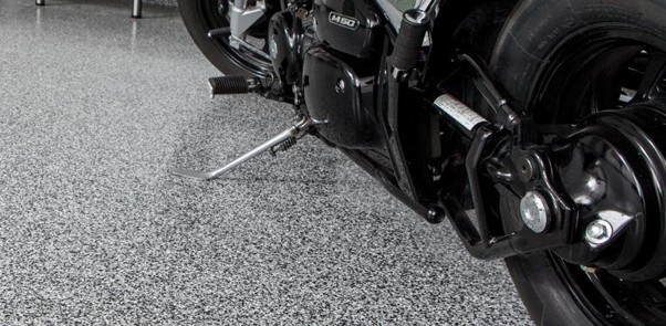 Why Garage Floor Coating Toronto Enhances Your Property Long Term?