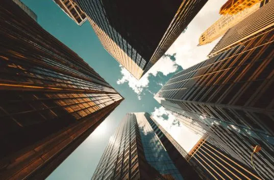 This may contain: looking up at skyscrapers in new york city stock photo