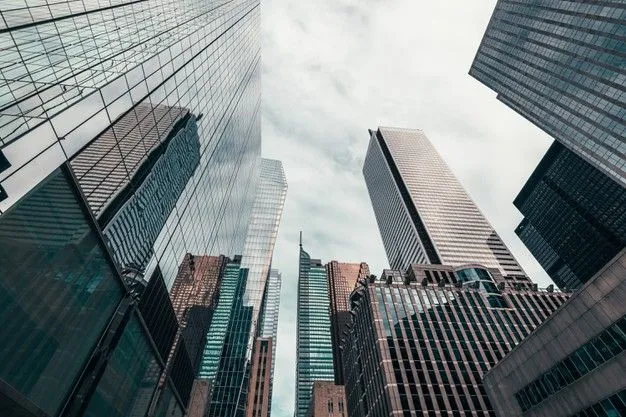 This may contain: looking up at tall buildings in the city