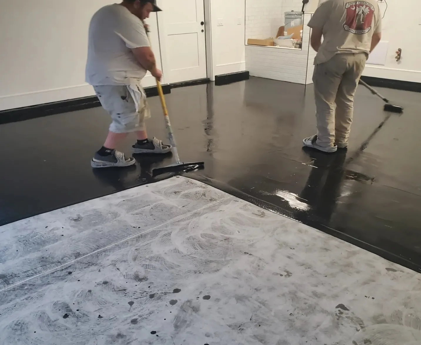 Applying epoxy resin to garage floor