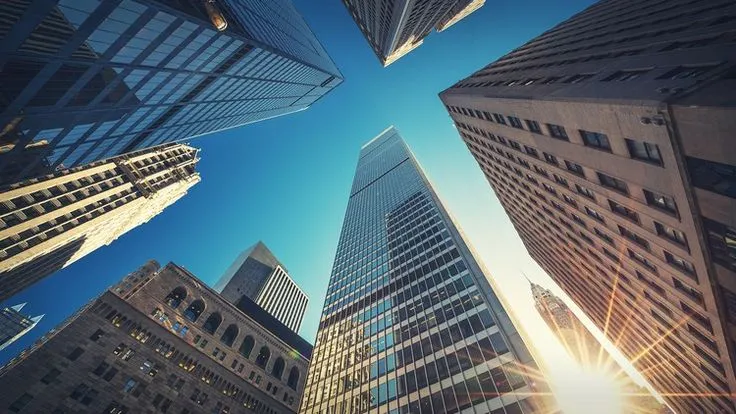 This may contain: looking up at skyscrapers in new york city, usa stock photo - 95978
