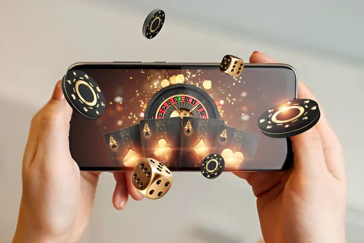 This may contain: a person holding up a phone with casino dices coming out of it and playing on the screen