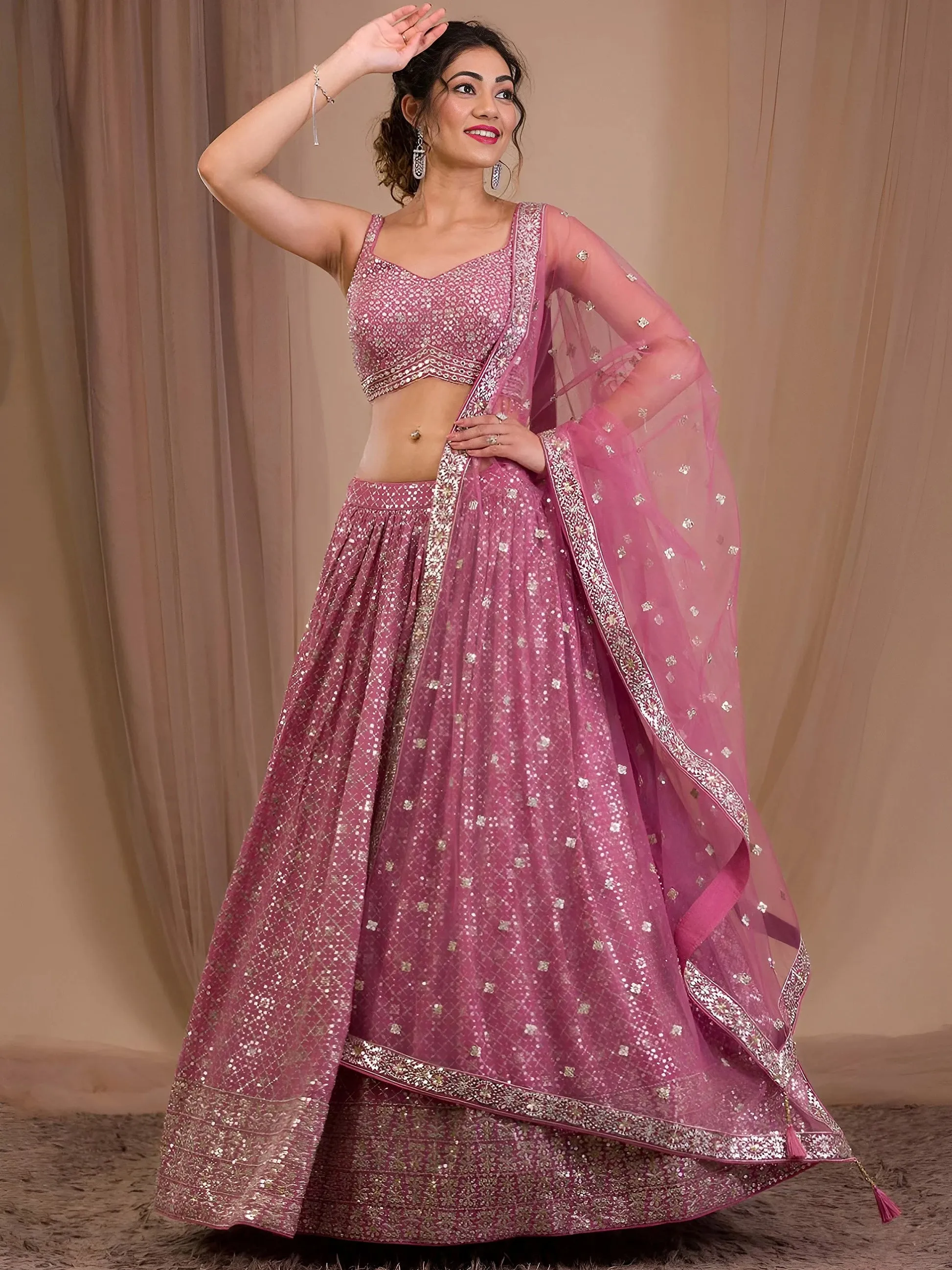 Attractive Pink Sequins Georgette Engagement Wear Lehenga Choli
