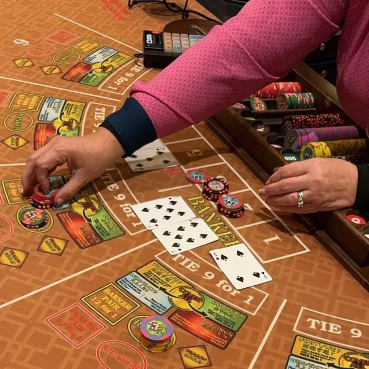 This may contain: a woman is playing cards on the table