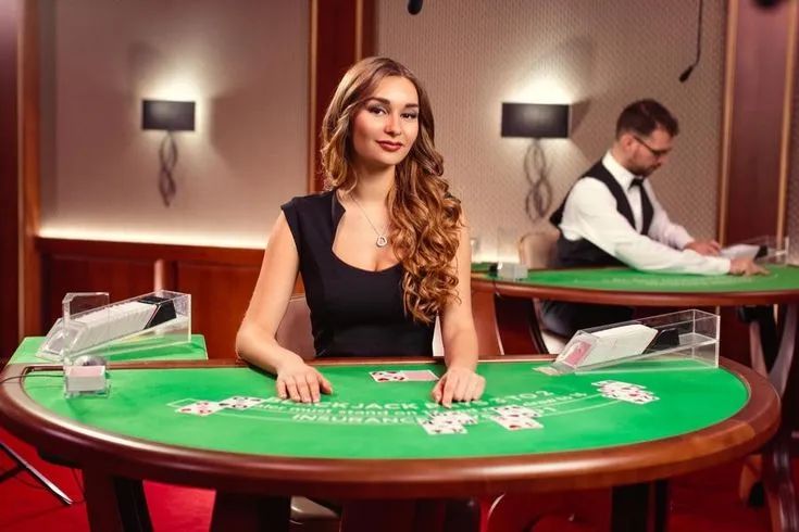 This may contain: a beautiful young lady sitting at a table in front of two men playing craps