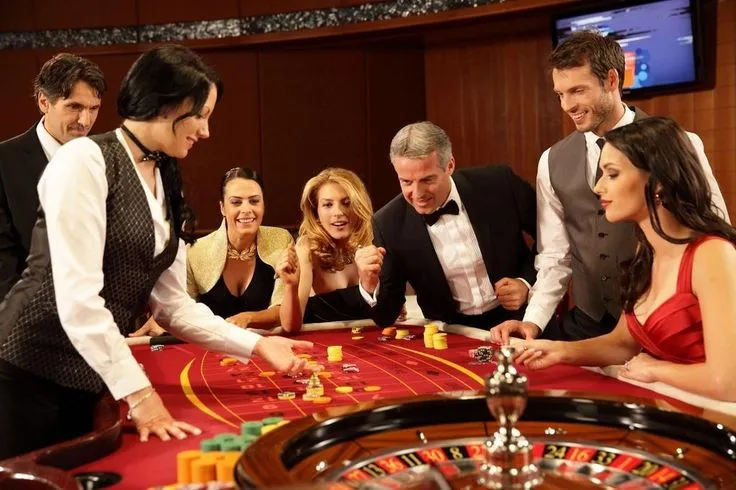 This may contain: a group of people standing around a roule