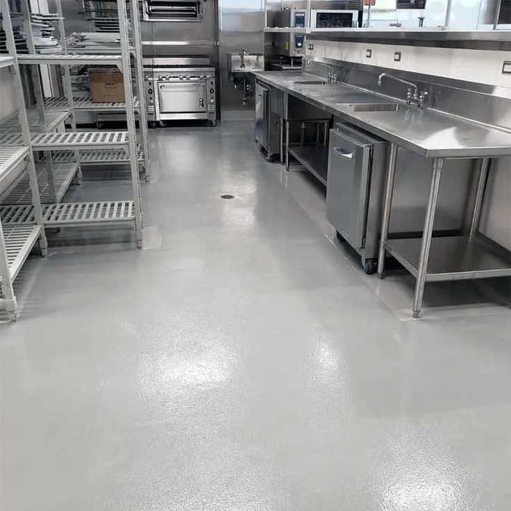 This may contain: a commercial kitchen with stainless steel appliances and shelving
