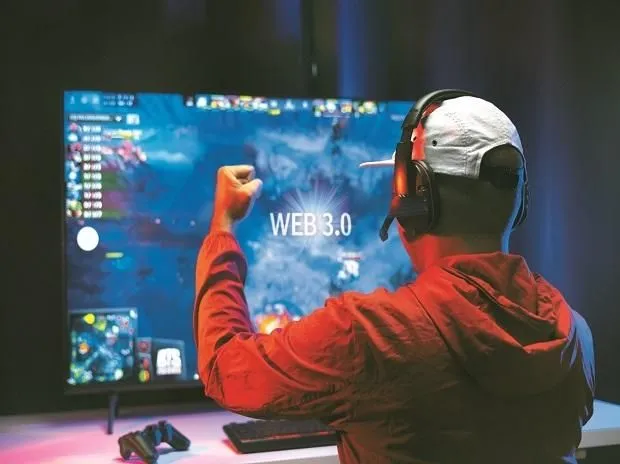 This may contain: a man wearing headphones is playing a video game on his computer screen with the words webbbo in front of him