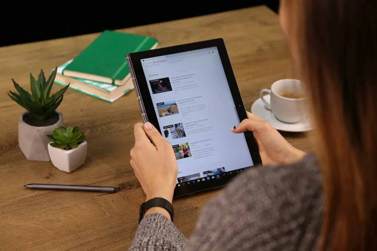Browsing an online blinds catalog on a tablet