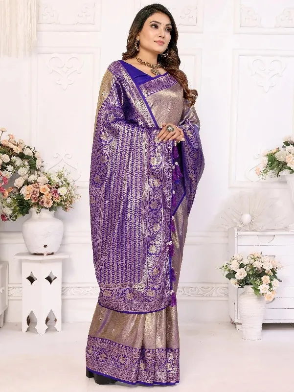 Purple and gold designer saree with intricate floral patterns and tassels, perfect for ethnic occasions.