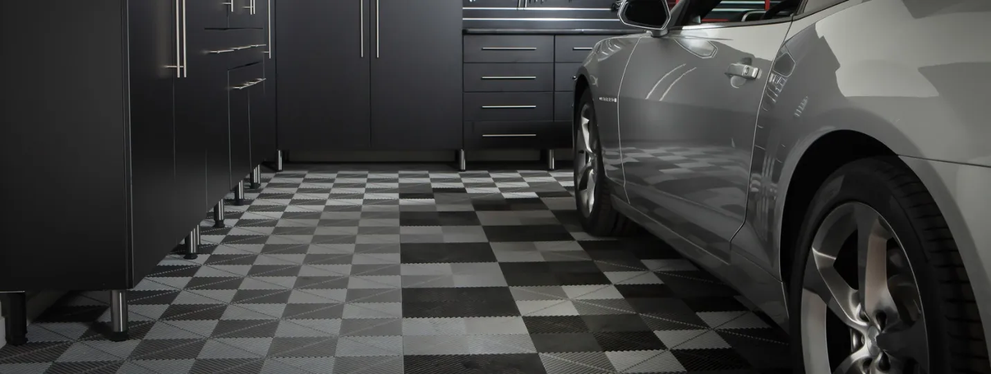 Camaro on garage floor tiles